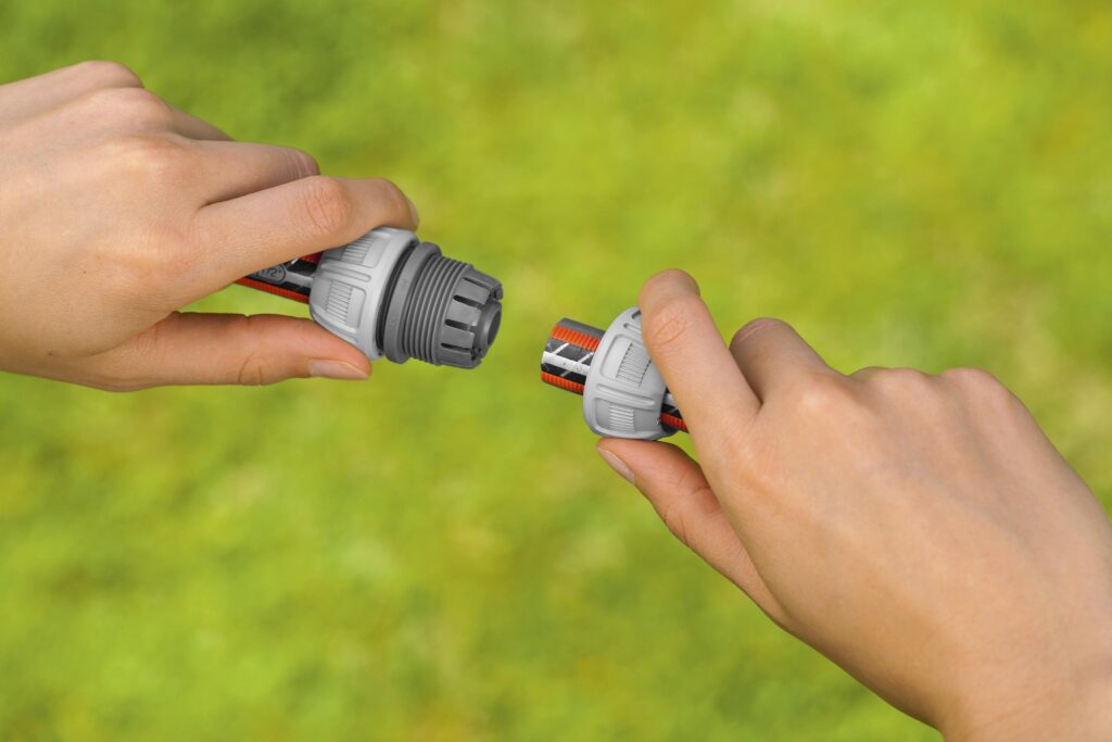 Gardena slang reparator under genomförande